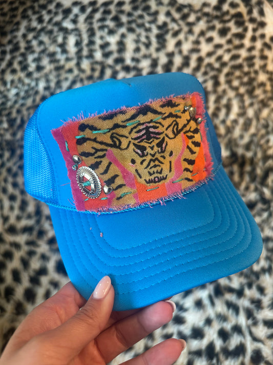 Tiger by the tail trucker hat