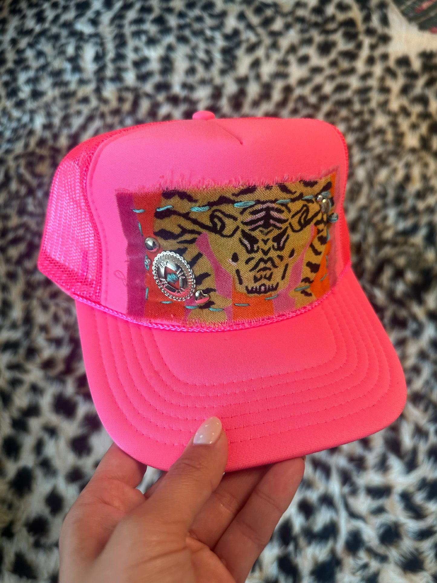 Tiger by the tail Trucker Hat